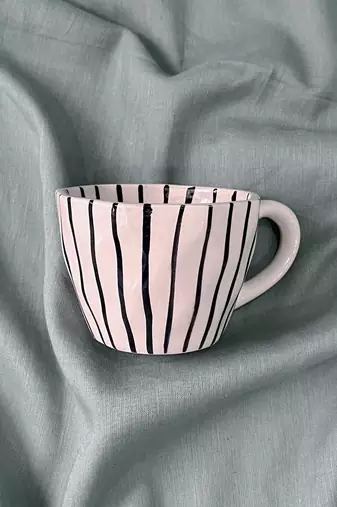 Harmony in Contrast: Hand-Painted Black Vertical Lines on Ivory-White Ceramic Mug, Inside and Out