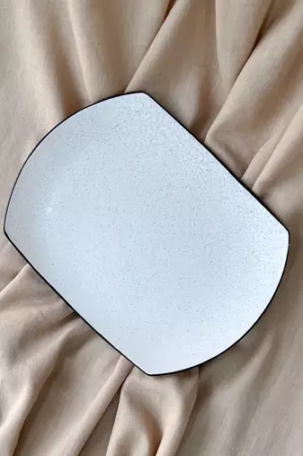 Effortless Elegance: Elongated Matt Ivory White Serving Tray with Unique Black Speckles and Rim