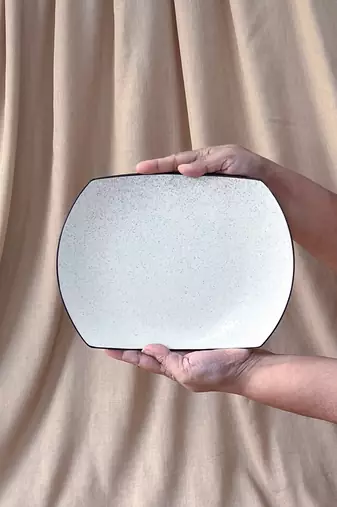 Effortless Elegance: Elongated Matt Ivory White Serving Tray with Unique Black Speckles and Rim