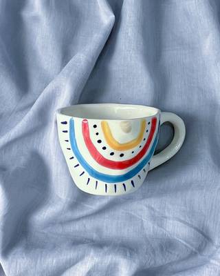 Radiant Spectrum: Hand-Painted, Hand-Glazed Ivory White Mug with Vibrant Rainbow Colors 2