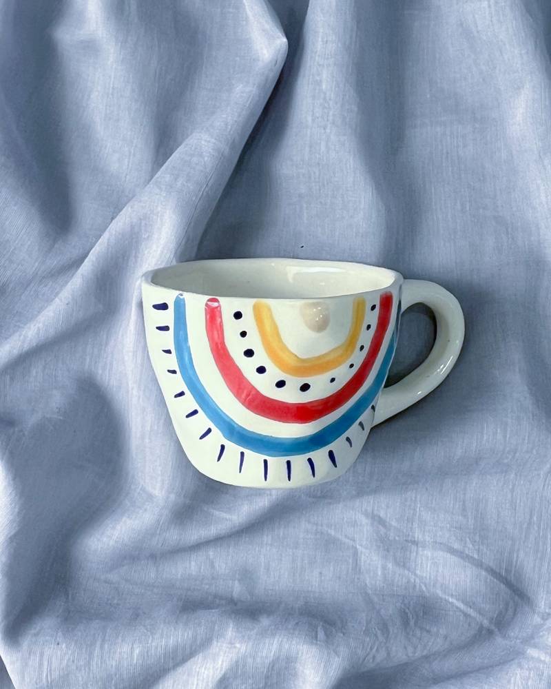 Radiant Spectrum: Hand-Painted, Hand-Glazed Ivory White Mug with Vibrant Rainbow Colors
