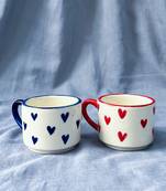 Heartfelt Elegance: Ivory White Mug with Blue Heart, Blue Rim, and Blue Handle