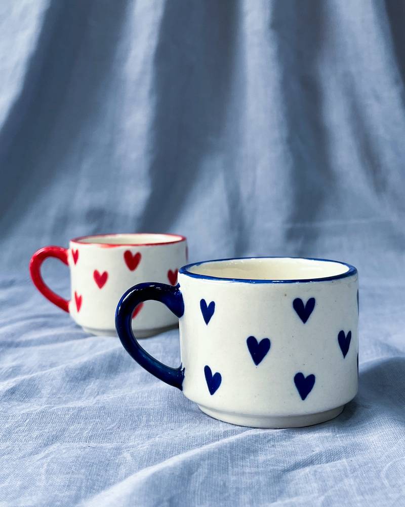 Heartfelt Elegance: Ivory White Mug with Blue Heart, Blue Rim, and Blue Handle
