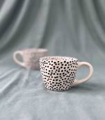 Whimsical Dot Dance: Handmade Ceramic Mug with Contrasting Polka Dots