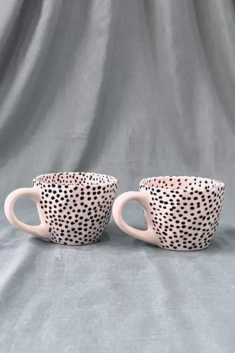 Whimsical Dot Dance: Handmade Ceramic Mug with Contrasting Polka Dots