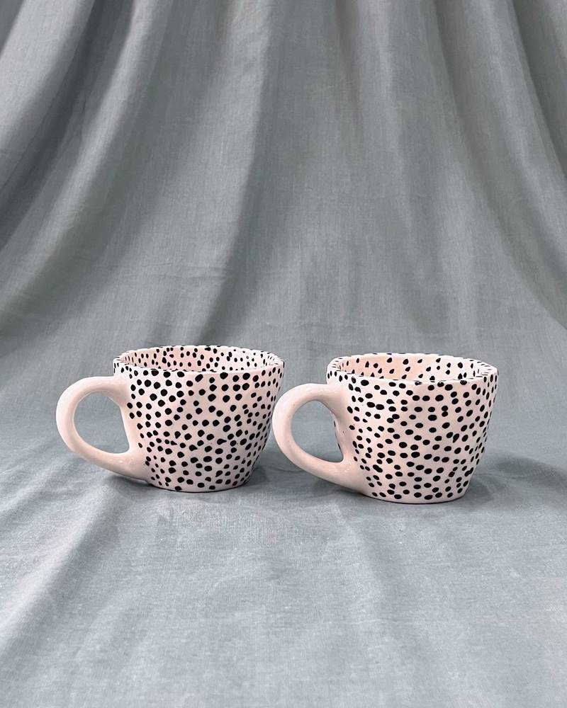 Whimsical Dot Dance: Handmade Ceramic Mug with Contrasting Polka Dots