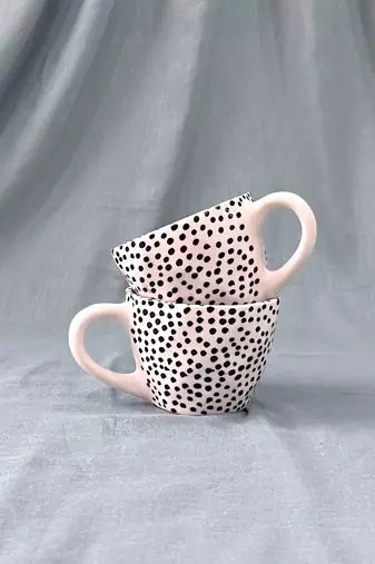 Whimsical Dot Dance: Handmade Ceramic Mug with Contrasting Polka Dots