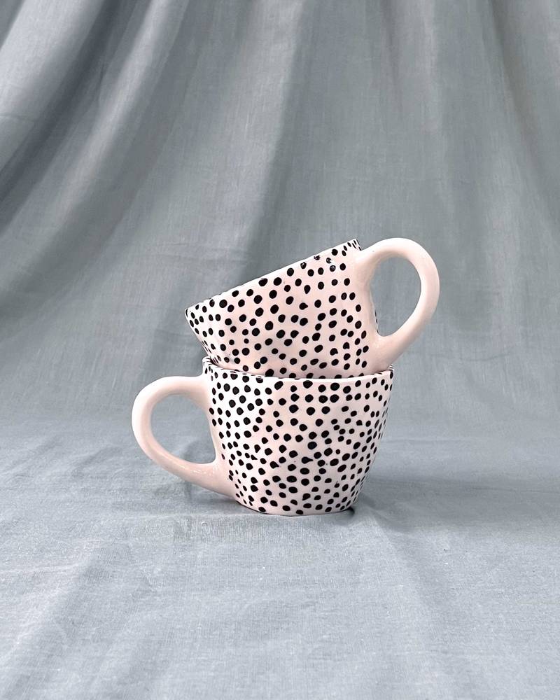 Whimsical Dot Dance: Handmade Ceramic Mug with Contrasting Polka Dots