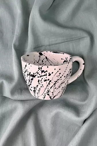 Ink Splatter Harmony: Handcrafted Ceramic Mug with Contrasting Black Splatters Inside