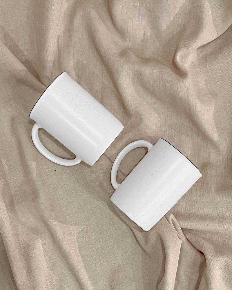 Mountain Cabin Serenity: Handcrafted Ivory White Campfire Mug with Unique Speckles and Hand-Painted