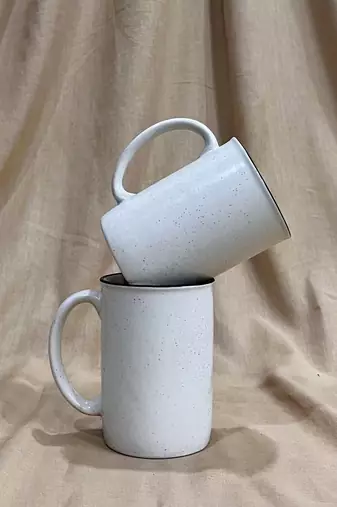 Mountain Cabin Serenity: Handcrafted Ivory White Campfire Mug with Unique Speckles and Hand-Painted