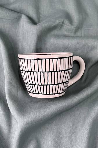 Urban Chic: Handcrafted Ceramic Mug with Brick Design Inside and Outside in Black on Ivory-White Background