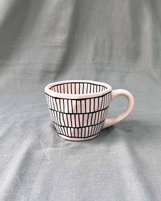Urban Chic: Handcrafted Ceramic Mug with Brick Design Inside and Outside in Black on Ivory-White Background 2