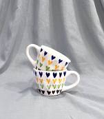 Passionate Delight: Hand-Painted, Hand-Glazed Ivory White Mug with Vibrant and Bold Hearts
