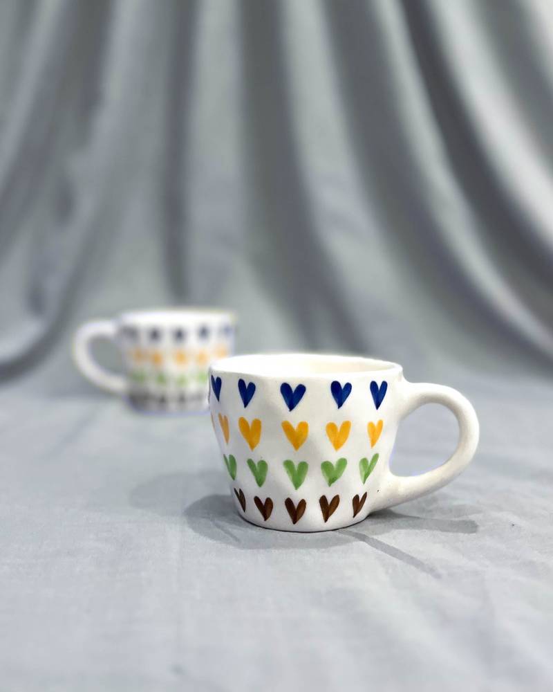 Passionate Delight: Hand-Painted, Hand-Glazed Ivory White Mug with Vibrant and Bold Hearts