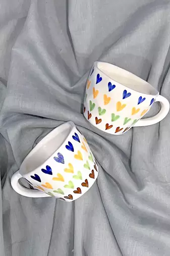 Passionate Delight: Hand-Painted, Hand-Glazed Ivory White Mug with Vibrant and Bold Hearts