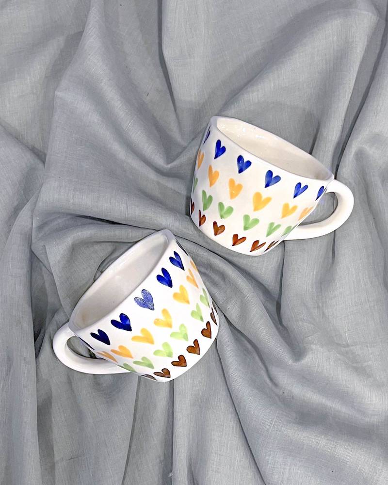Passionate Delight: Hand-Painted, Hand-Glazed Ivory White Mug with Vibrant and Bold Hearts