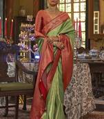 Parrot green kanjivaram silk woven jacquard work saree with blouse