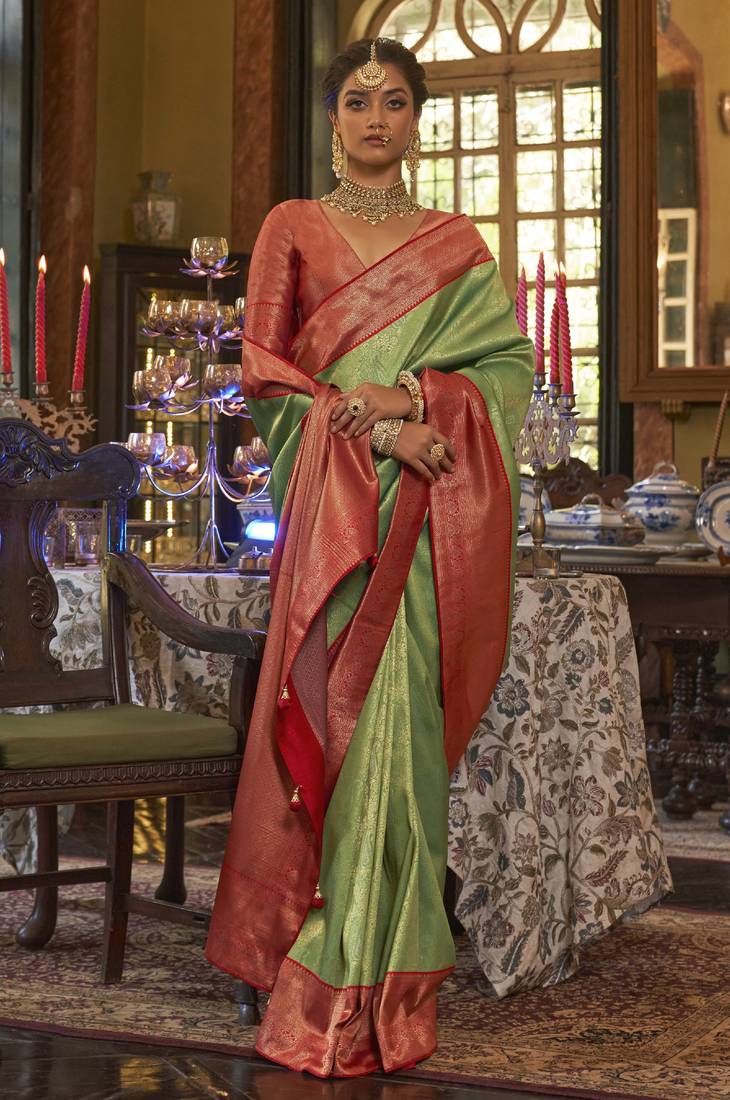 Parrot green kanjivaram silk woven jacquard work saree with blouse
