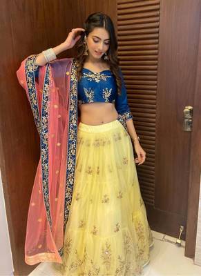 yellow embroidered net semi stitched lehenga 5