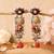 Two tone finish multi colored stone dangler earrings
