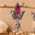 Silver finish pink stone temple dangler earrings