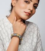 Gold plated silver hand graved statement rawa bangle