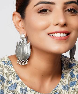 Silver oxidized lotus stud earrings with ghungroo 1