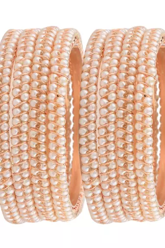  timeless elegance: set of 4 gold-plated pearl bangles