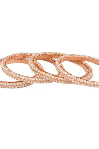  timeless elegance: set of 4 gold-plated pearl bangles