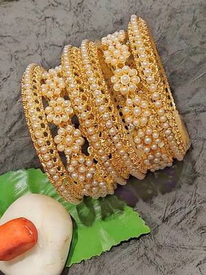  floral splendor: set of 6 gold plated pearl bangles with floral motifs 2