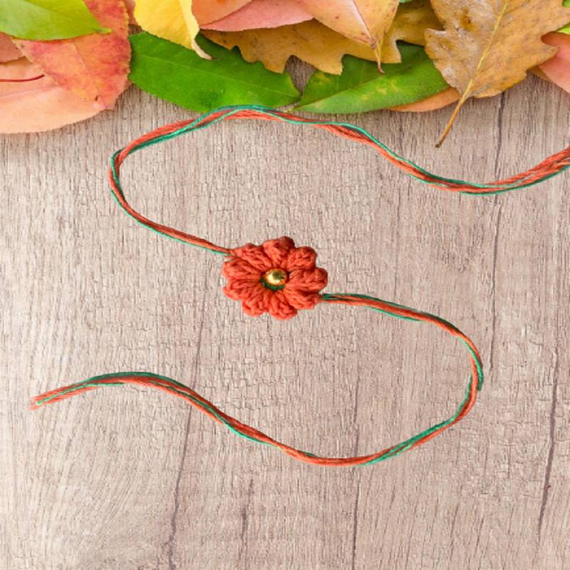 C-Knits Crochet handmade ecofriendly flower Kids Rakhi - Orange (CTRI-14-001)