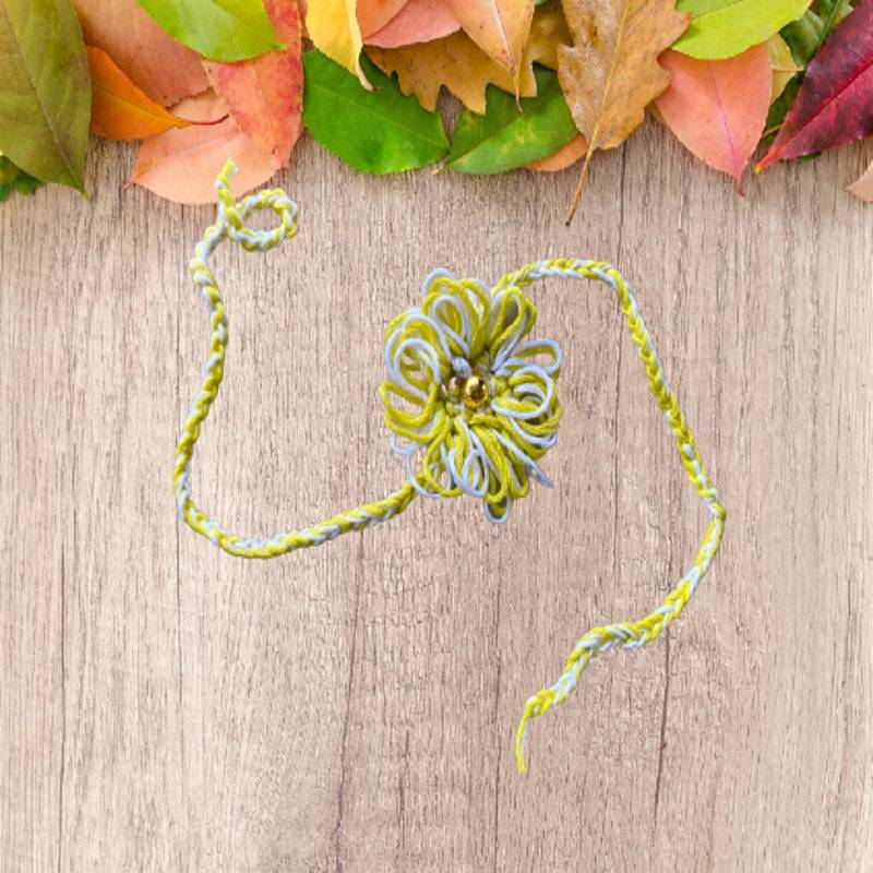 C-Knits Crochet handmade ecofriendly flower Kids Rakhi - Yellow (CTRI-18-001)