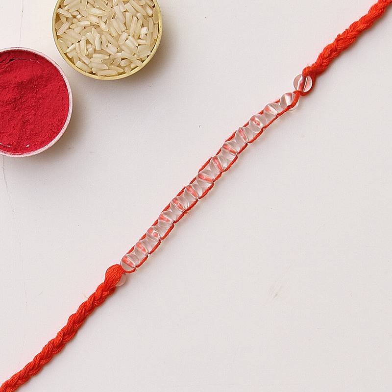 C-Knits crochet handmade rakhi with transparent beads with pom pom-orange