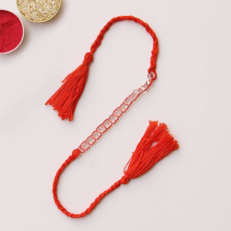 C-Knits crochet handmade rakhi with transparent beads with pom pom-orange