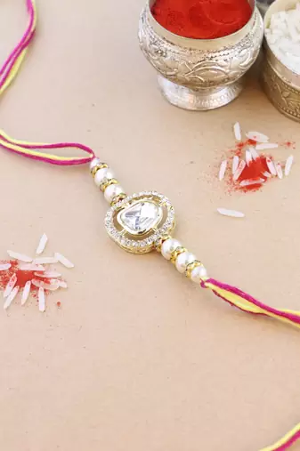 rakshabhandhan special kundan stone rakhi with roli chawal for bhaiya/brother/mens (r094w-3) (pack of 3 rakhi )
