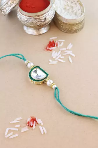 rakshabhandhan special kundan stone rakhi with roli chawal for bhaiya/brother/mens (r095g)