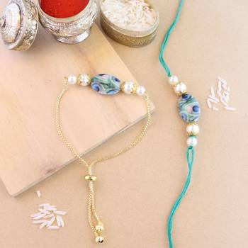 I jewels rakshabhandhan special peacock feather beaded bhaiya bhabhi chain lumba bracelet rakhi combo set with roli 1