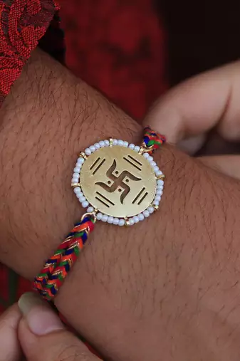 Golden Beaded Swastik Rakhi