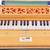 OM Harmonium Mini Magic By Kaayna Musicals, No Stop- 2 Octave, Teak Colour, Gig Bag