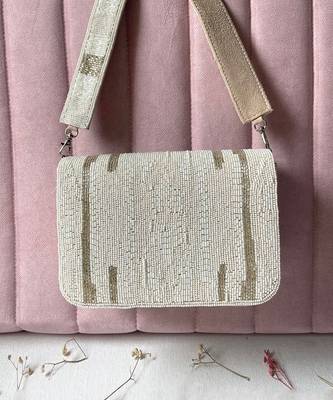 White & silver cut dana embellished bucket bag 1