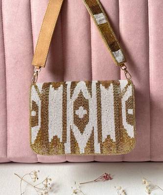 Gold & white cut dana embellished bucket bag 1