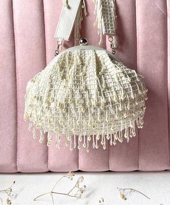White dangling embellished potli bag 1