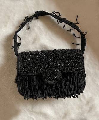 Black studded tassel bucket bag 1