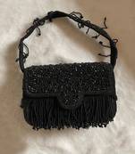 Black studded tassel bucket bag