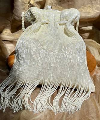 White dangling tassel embellished potli bag 1