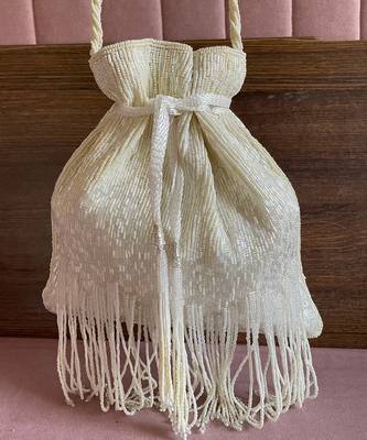 White dangling tassel embellished potli bag 2