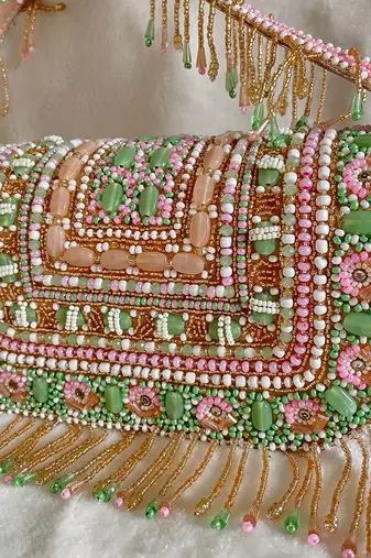 Multi studded bucket bag
