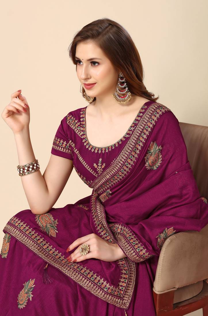 Wine chinon embroidered saree with unstitched blouse piece.