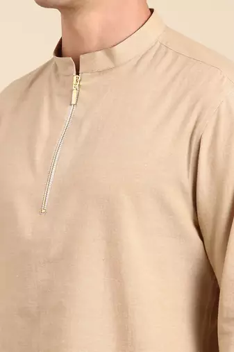 this short kurta can be paired up with white/black pant.